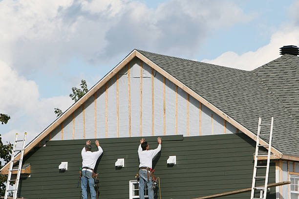 Professional Emergency Siding Repair technician working in Old Bethpage, NY
